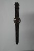WOMEN ROUND CASE WRIST WATCH DARK BROWN STRAP IN ANIMAL PRINT AND DARK BROWN DIAL WITH GOLDEN DETAILS(OEM)